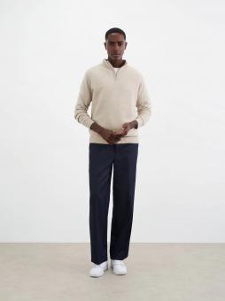 Beige half zip sweater on male model