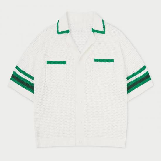 White knit shirt with green trim accents