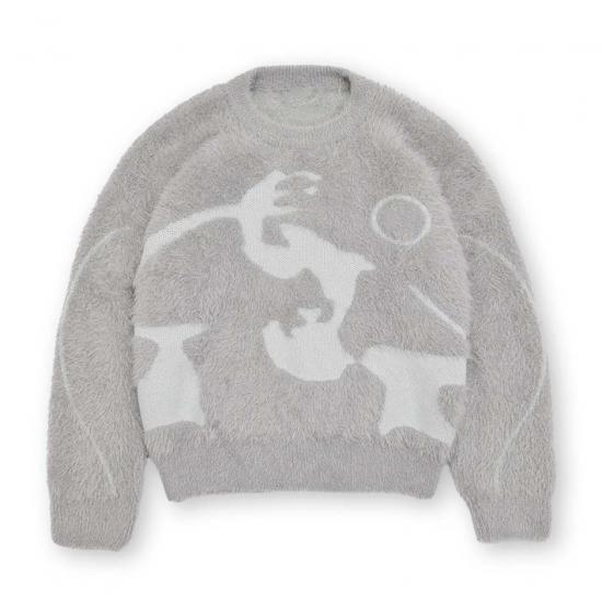 Soft plush knitwear with geometric pattern