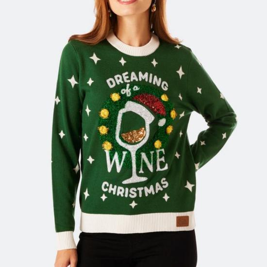 Green Christmas sweater with star decorations