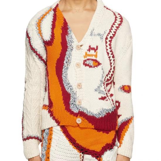 Black sweater with Halloween pumpkin design