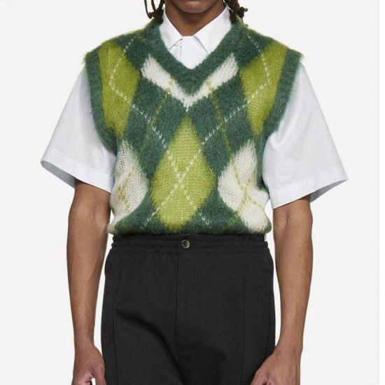 Green argyle vest over white shirt