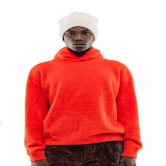 Orange plush hooded sweatshirt on model