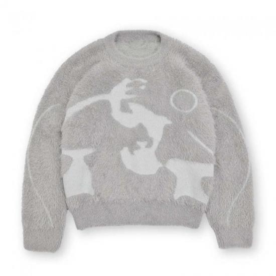 Soft plush knitwear with geometric pattern