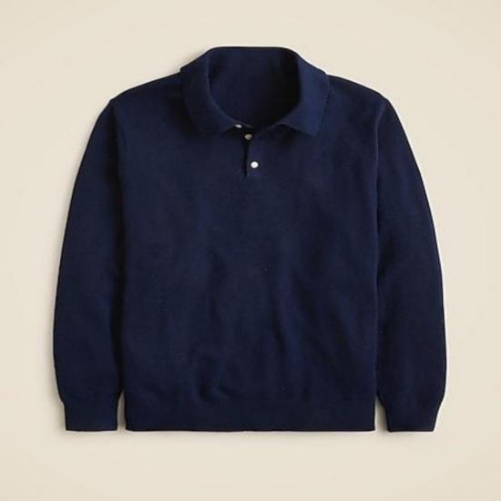 Green argyle vest over white shirt