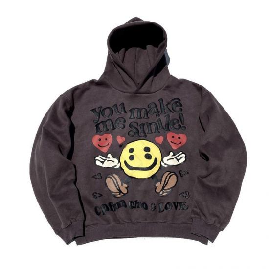Brown hoodie with yellow smiley face